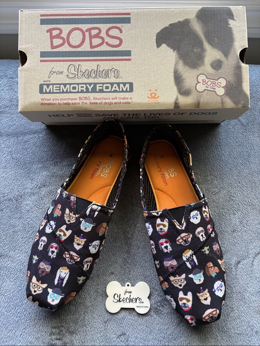 Skechers Women's Black Slip-On Flats with Multicolor Dog Print
